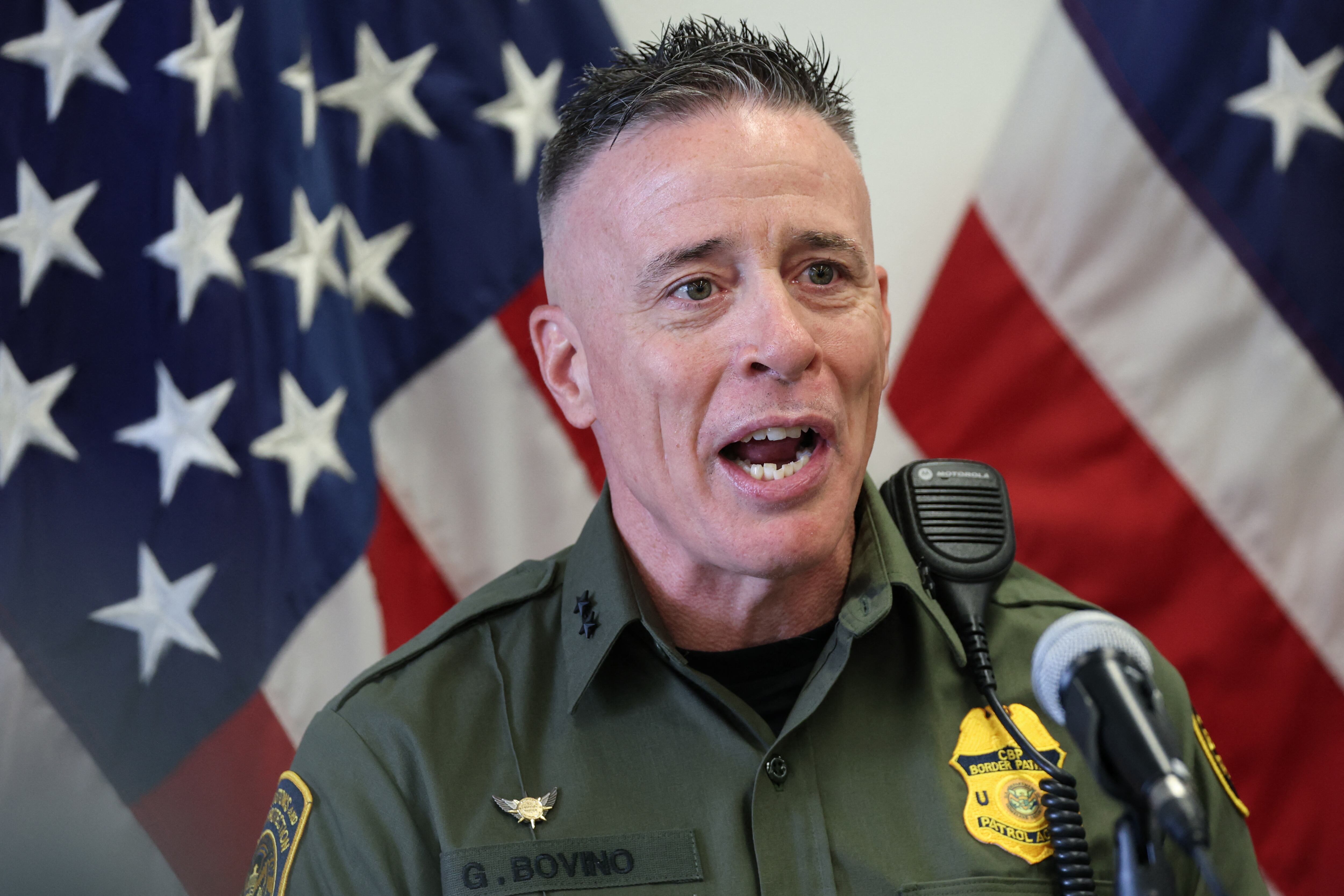 Gregory Bovino, Chief Patrol Agent at the El Centro Sector of US Customs and Border Patrol, speaks during a news conference with Department of Homeland Security Secretary Kristi Noem (out of frame) at the Wilshire Federal Building in Los Angeles on June 12, 2025. US President Donald Trump said Thursday that Los Angeles was "safe and sound" for the past two nights, crediting his deployment of thousands of troops to quell anti-deportation protests, as California prepared for a legal showdown over his unprecedented move. With protests spreading across the United States, a night-time curfew has been in place in its second-largest city with authorities tackling vandalism and looting that scarred a few city blocks. (Photo by Patrick T. Fallon / AFP)