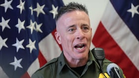 Gregory Bovino, Chief Patrol Agent at the El Centro Sector of US Customs and Border Patrol, speaks during a news conference with Department of Homeland Security Secretary Kristi Noem (out of frame) at the Wilshire Federal Building in Los Angeles on June 12, 2025. US President Donald Trump said Thursday that Los Angeles was "safe and sound" for the past two nights, crediting his deployment of thousands of troops to quell anti-deportation protests, as California prepared for a legal showdown over his unprecedented move. With protests spreading across the United States, a night-time curfew has been in place in its second-largest city with authorities tackling vandalism and looting that scarred a few city blocks. (Photo by Patrick T. Fallon / AFP)