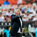 Real Madrid's head coach Carlo Ancelotti gives instruction inside the box team area during a Spanish La Liga soccer match between Valencia and Real Madrid at the Mestalla stadium in Valencia, Spain, Sunday, Sept. 19, 2021. (AP Photo/Alberto Saiz)