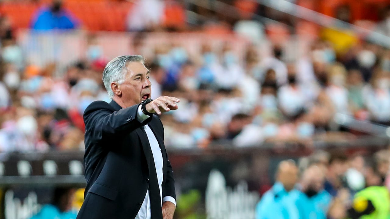 Real Madrid's head coach Carlo Ancelotti gives instruction inside the box team area during a Spanish La Liga soccer match between Valencia and Real Madrid at the Mestalla stadium in Valencia, Spain, Sunday, Sept. 19, 2021. (AP Photo/Alberto Saiz)