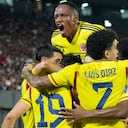 Selección Colombia celebrando el gol de Santos Borré frente a Paraguay.