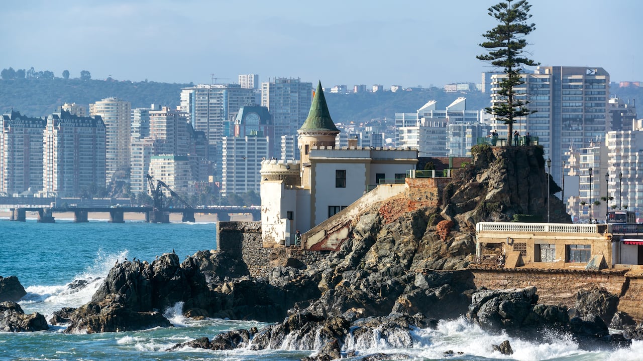 View of Wulff Castle with apartment buildings in the background in Vina del Mar, Chile