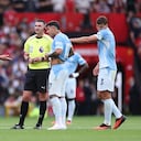 MANCHESTER, ENGLAND - SEPTEMBER 13: Erling Haaland of Manchester City speaks with Referee Michael Oliver as a VAR check is performed after his goal is initially ruled offside, only to be overturned during the Premier League 2026/27 match between Manchester United and Manchester City at Old Trafford on September 13, 2026 in Manchester, England. (Photo by Marc Atkins/Getty Images)