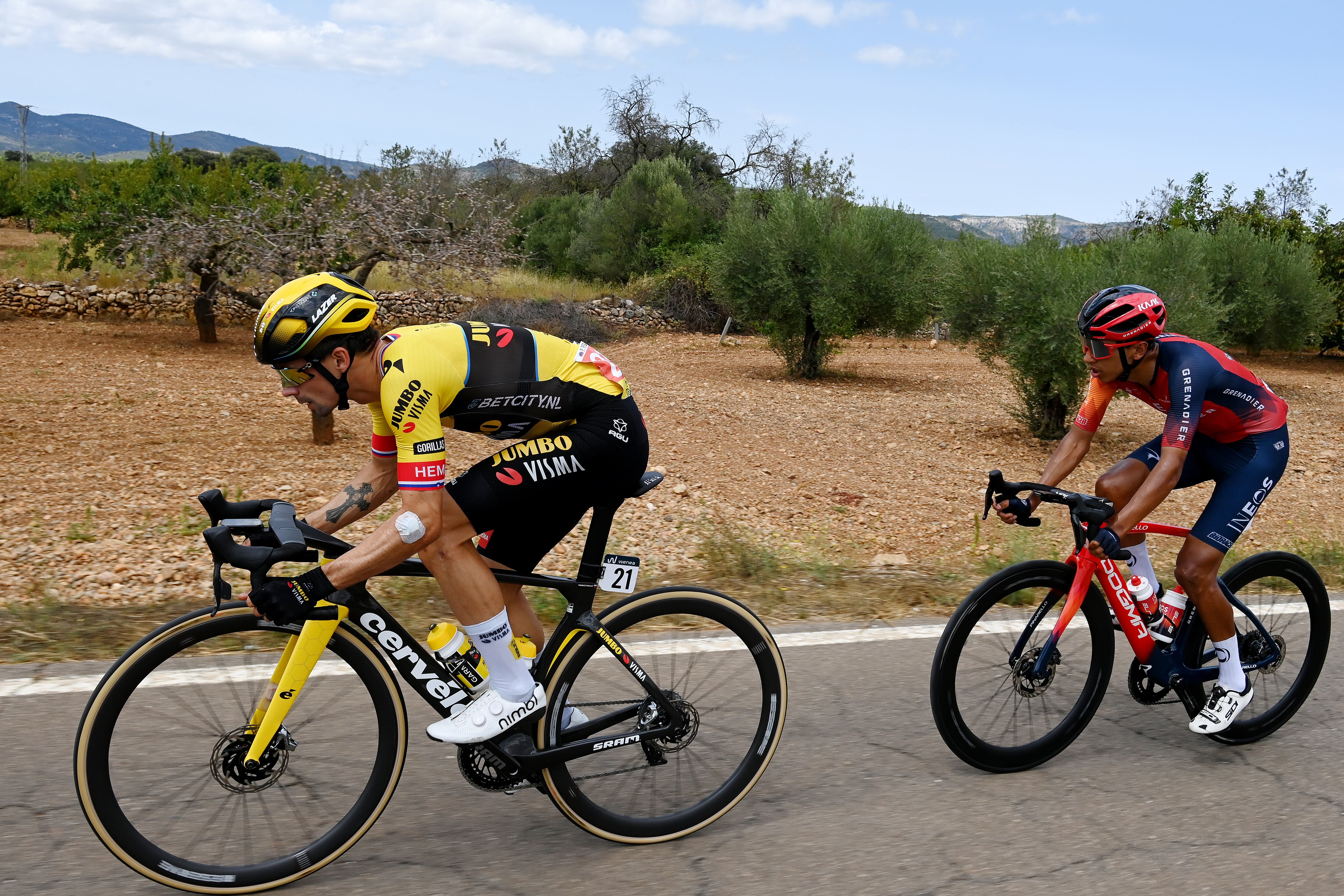 BURRIANA, SPAIN - AUGUST 30: (L-R) Primoz Roglic of Slovenia and Team Jumbo-Visma and Egan Bernal of Colombia and Team INEOS Grenadiers compete during the 78th Tour of Spain 2023, Stage 5 a 184.6km stage from Burriana to Burriana / #UCIWT / on August 30, 2023 in Morella, Spain. (Photo by Tim de Waele/Getty Images)