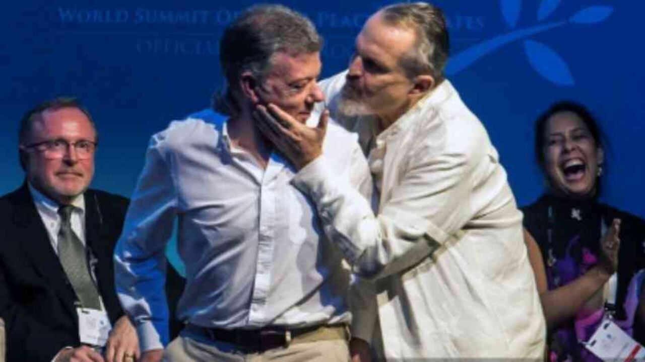 Miguel Bosé y Juan Manuel Santos.