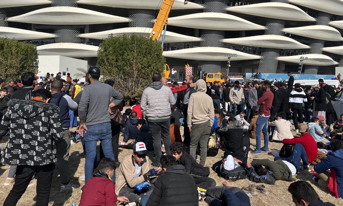 Iraq's supporters gather outside the Basra International Stadium in the country's southern city on January 19, 2023, after a stampede took place hours before the evening's final match of the Arabian Gulf Cup between Iraq and Oman. One person was killed and dozens injured when a stampede broke out outside a football stadium in Iraq hours before the Gulf Cup final, medical and security sources said, as thousands of fans without tickets had gathered outside the stadium since dawn in the hope of watching the rare home international match which was due to kick off at 7 pm (1600 GMT).
AFP/Hussein FALEH