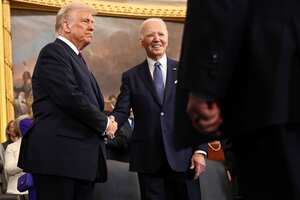 President-elect Donald Trump greets President Joe Biden during the 60th Presidential Inauguration in the Rotunda of the U.S. Capitol in Washington, Monday, Jan. 20, 2025. (Chip Somodevilla/Pool Photo via AP)