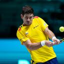 Colombia's Nicolas Mejia returns the ball to United States' Frances Tiafoe during their Davis Cup men's single Finals tennis match at the Pala Alpitour in Turin, Italy, Sunday, Nov. 28, 2021. (AP Photo/Antonio Calanni)