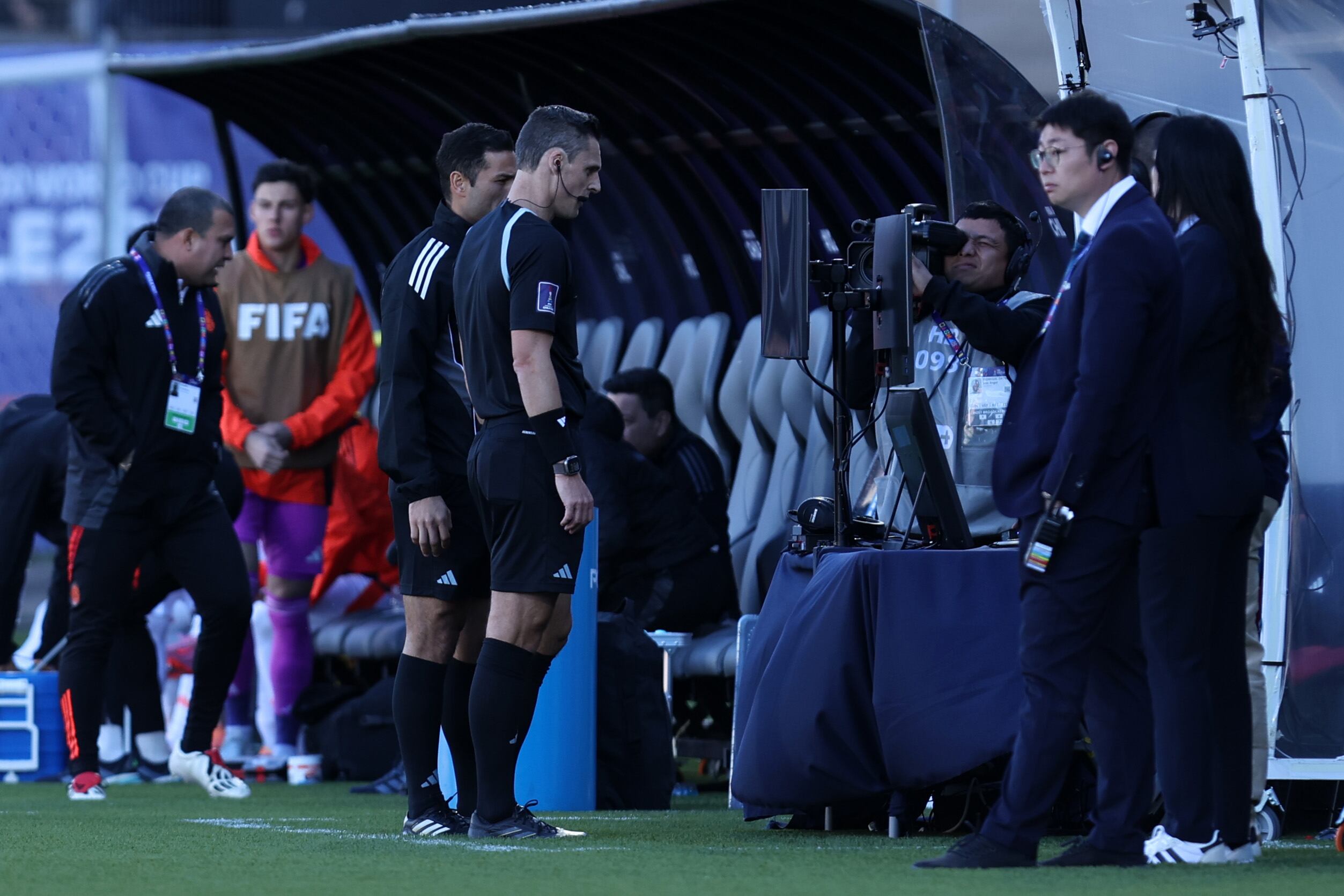 TALCA, CHILE - OCTOBER 11: Referee Joseph Dickerson checks a possible penalty for Spain with Football Video Support - FVS during the FIFA U-20 World Cup Chile 2025 quarter-final match between Spain and Colombia at Estadio Fiscal on October 11, 2025 in Talca, Chile. (Photo by Ricardo Moreira - FIFA/FIFA via Getty Images)