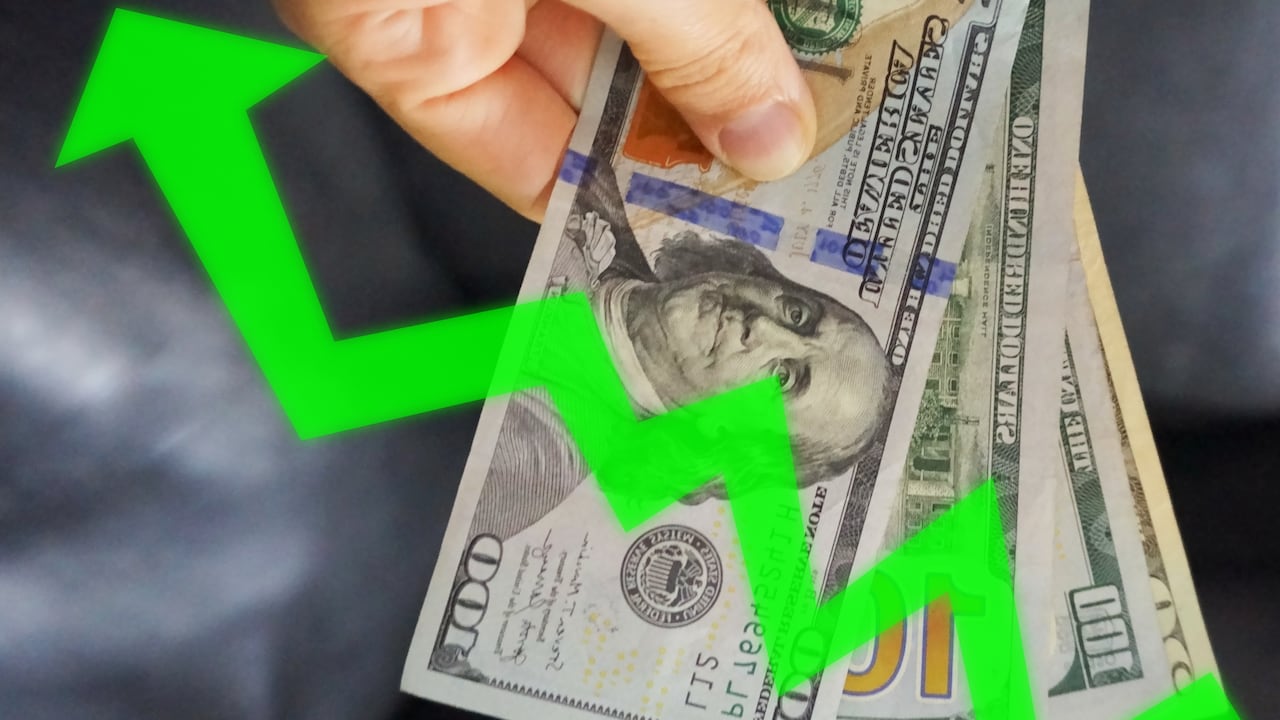 Profits, increase in the dollar rate, improvement of the economy, greater investment, greater spending. A person holding some dollars.