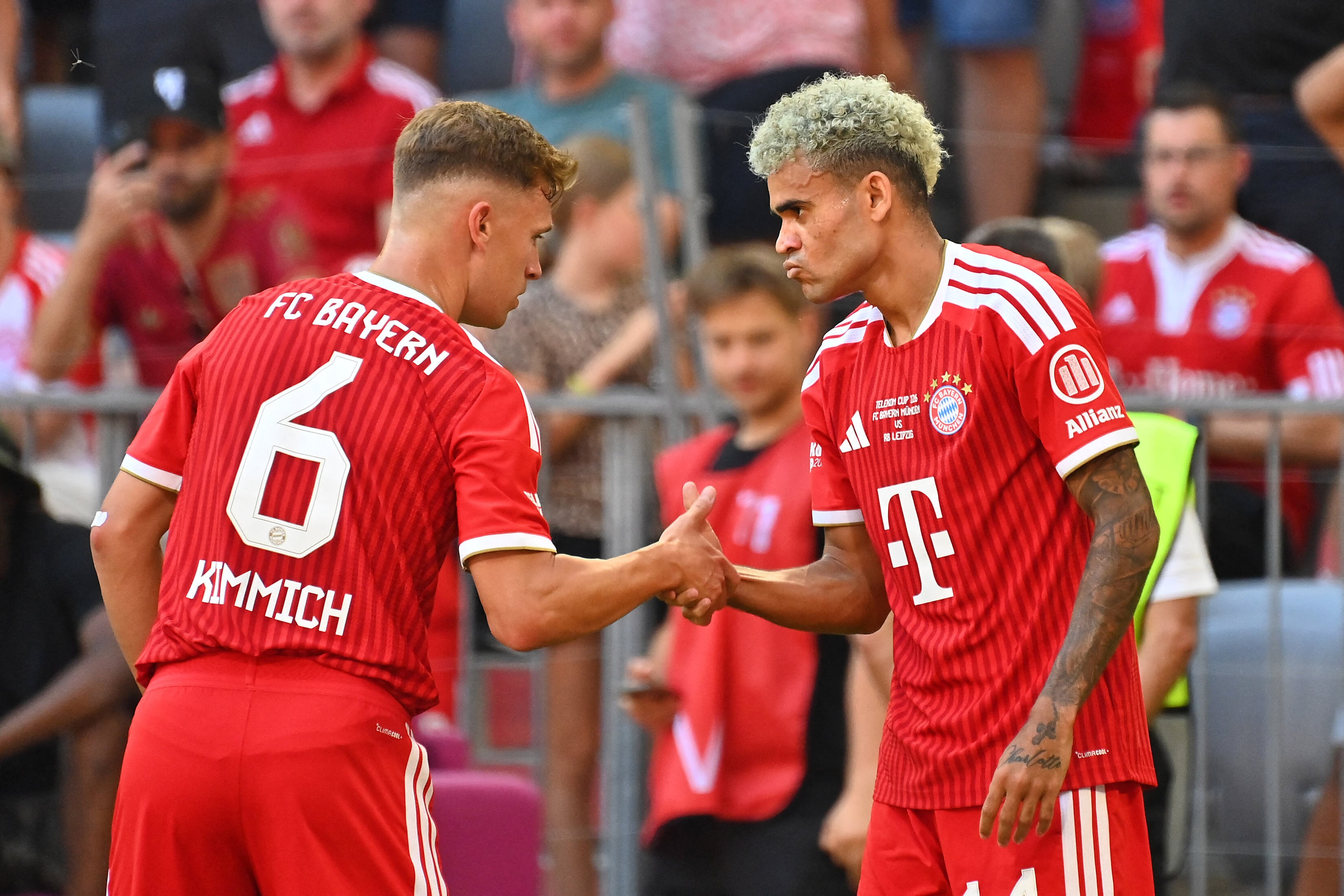 Goal celebration [goal celebration] Luis DIAZ (FC Bayern Munich, re) after goal [goal] for 1-0 with Joshua KIMMICH (FC Bayern Munich). Cheering, joy, enthusiasm, action, Soccer Telekom Cup FC FC Bayern Munich - RB Leipzig on August 15, 2025, Allianz (Photo by Frank Hoermann/SVEN SIMON / SVEN SIMON / dpa Picture-Alliance via AFP)