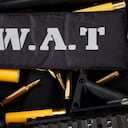 SWAT - Special weapons and tactics team weapon, ammunitions and equipment on black uniform background