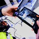 El controlador de tableta Spot, un dispositivo que permite controlar de forma remota el robot de cuatro patas insignia de Boston Dynamics y uno de los robots más avanzados a nivel mundial, se muestra en el stand de IBM durante el Mobile World Congress (MWC), la mayor feria del mundo centrada en dispositivos móviles, 5G, IOT, AI y big data, el 3 de marzo de 2022 en Barcelona, España.
(Photo by Joan Cros/NurPhoto via Getty Images)