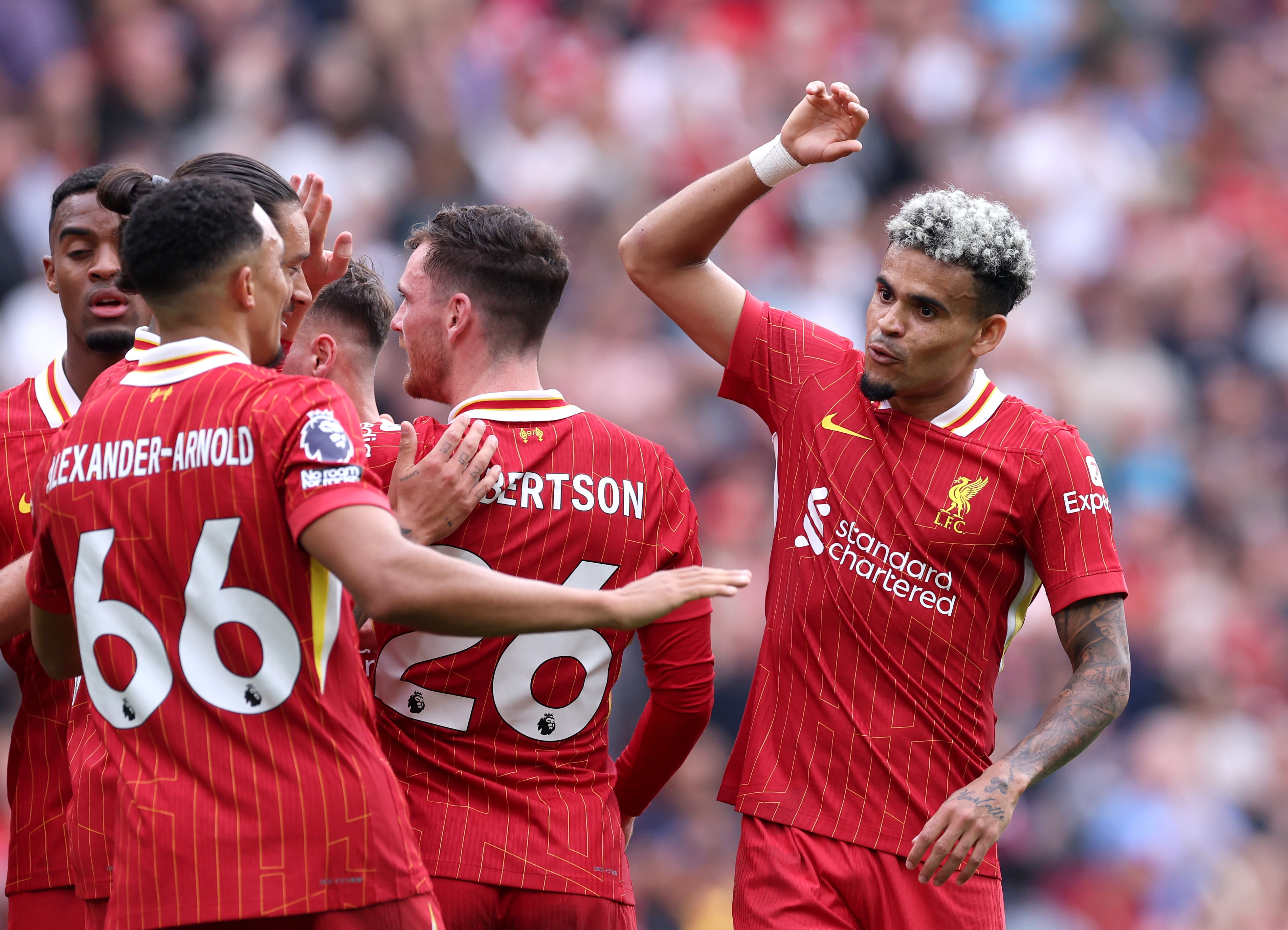 LIVERPOOL, ENGLAND - SEPTEMBER 21: Luis Diaz of Liverpool celebrates with Trent Alexander-Arnold after scoring his team's second goal during the Premier League match between Liverpool FC and AFC Bournemouth at Anfield on September 21, 2024 in Liverpool, England. (Photo by Alex Livesey/Getty Images)
