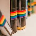 Shelf with LGBTQ awareness books at the public library.
