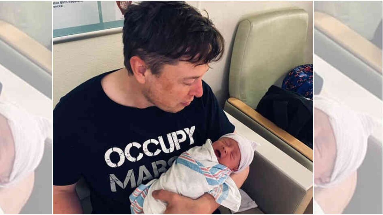 Elon Musk con su hijo X AE A-12 Musk.