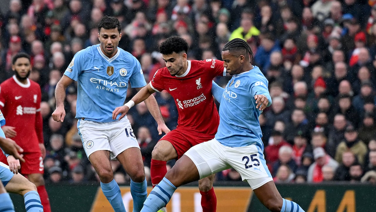 LIVERPOOL, ENGLAND - MARCH 10: (THE SUN OUT, THE SUN ON SUNDAY OUT) Luis Diaz of Liverpool and Manuel Akanji of Manchester City in action during the Premier League match between Liverpool FC and Manchester City at Anfield on March 10, 2024 in Liverpool, England. (Photo by Nick Taylor/Liverpool FC/Liverpool FC via Getty Images)