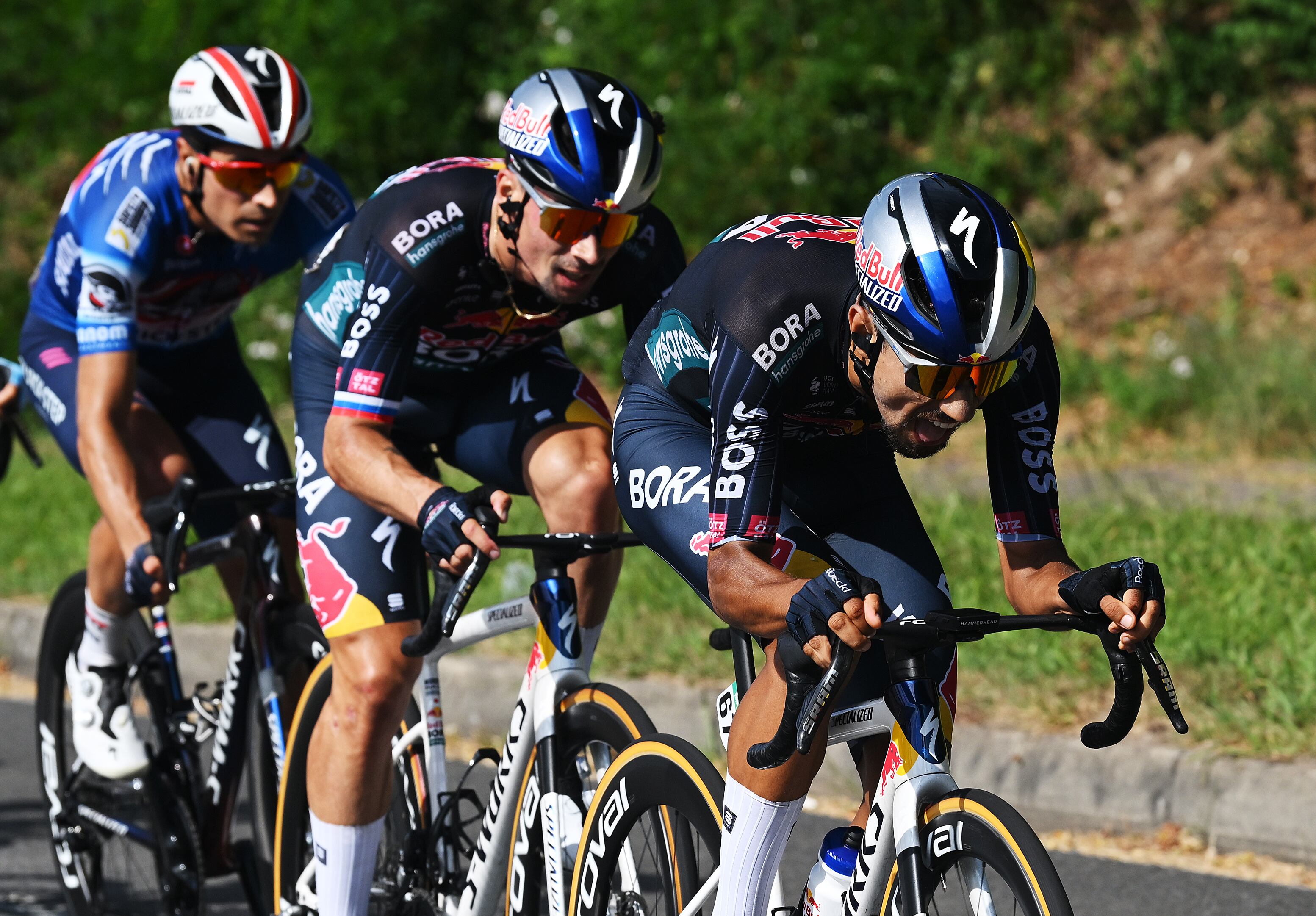 PADRON, SPAIN - AUGUST 28: (L-R) Primoz Roglic of Slovenia and Daniel Martinez of Colombia and Team Red Bull Bora - hansgrohe compete during the La Vuelta - 79th Tour of Spain 2024, Day 11 a 166.5km stage from Padron to Padron / #UCIWT / on August 28, 2024 in Padron, Spain. (Photo by Dario Belingheri/Getty Images)