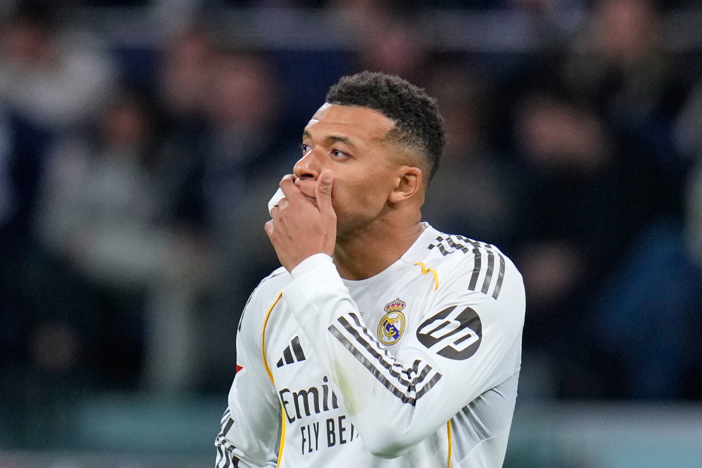 Real Madrid's Kylian Mbappe reacts during the Spanish La Liga soccer match between Real Madrid and Celta Vigo in Madrid, Spain, Sunday, Dec. 7, 2025. (AP Photo/Manu Fernandez)