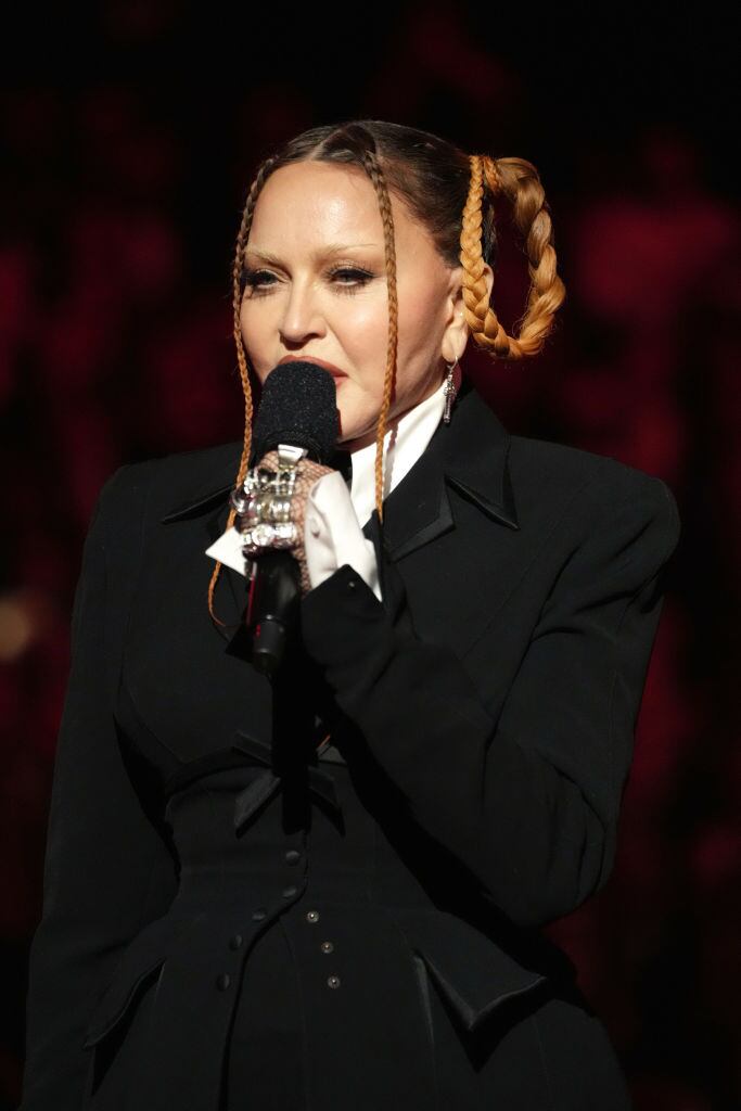 LOS ANGELES, CALIFORNIA - FEBRUARY 05: Madonna speaks onstage during the 65th GRAMMY Awards at Crypto.com Arena on February 05, 2023 in Los Angeles, California. (Photo by Kevin Mazur/Getty Images for The Recording Academy)