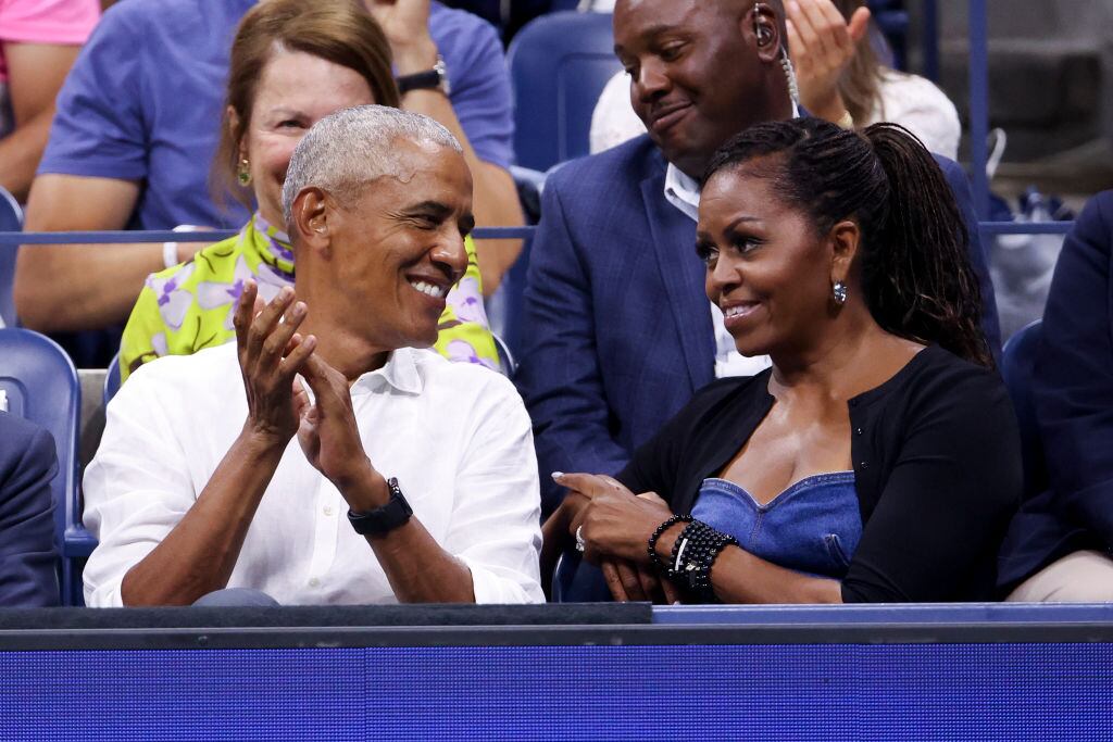 NEW YORK, NEW YORK - AUGUST 28: Former President of the United States Barack Obama and former First Lady Michelle Obama attend the men's singles first round match between Novak Djokovic of Serbia and Alexandre Muller of France during day one of the 2023 US Open at Arthur Ashe Stadium at the USTA Billie Jean King National Tennis Center on August 28, 2023 in the Flushing neighborhood of the Queens borough of New York City. (Photo by Jean Catuffe/GC Images)