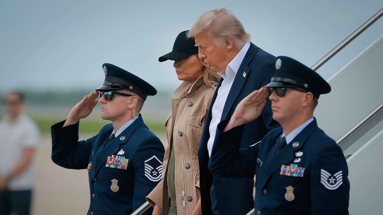 SAN ANTONIO, TEXAS - JULY 11: President Donald Trump and first lady Melania Trump arrive at Lackland Air Force Base before heading to Kerrville, Texas where they plan to visit with state and local leaders, first responders and victims of last week's flash flooding on July 11, 2025 in San Antonio, Texas. Trump traveled to Texas one week after flash flooding along the Guadalupe River swept through cities, mobile home parks and summer camps, killing 120 people. Ninety-six of those killed were in Kerr County, where the toll includes at least 36 children. (Photo by Chip Somodevilla/Getty Images)