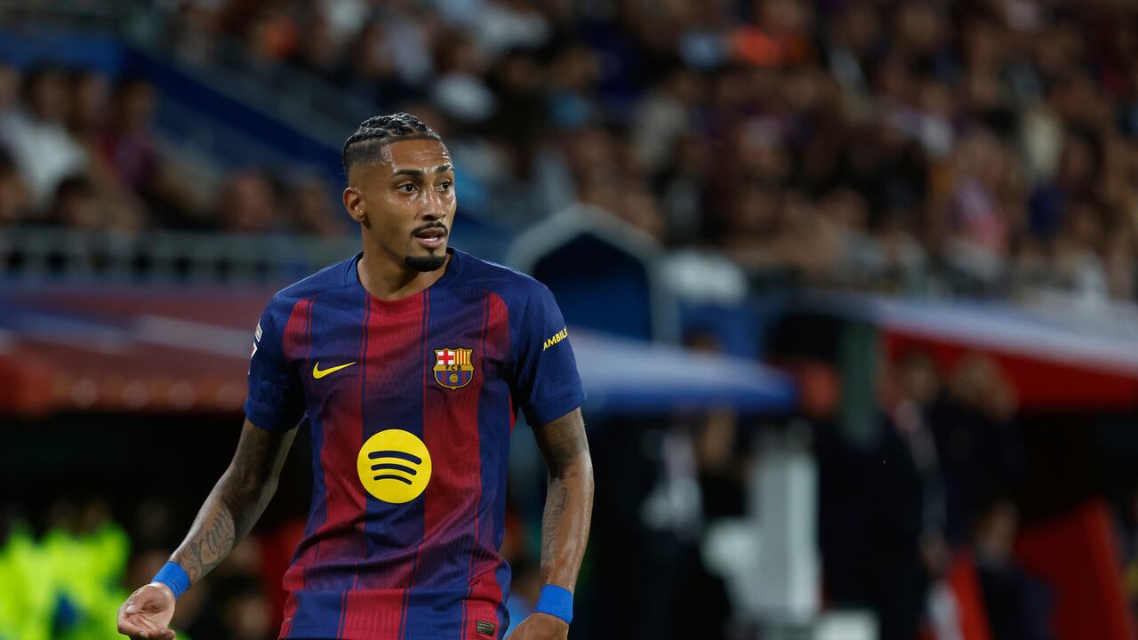 Barcelona's Raphinha runs for the ball during a Spanish La Liga soccer match between FC Barcelona and Getafe at the Johan Cruyff stadium in Barcelona, Spain, Sunday, Sept. 21, 2025. (AP Photo/Joan Monfort)