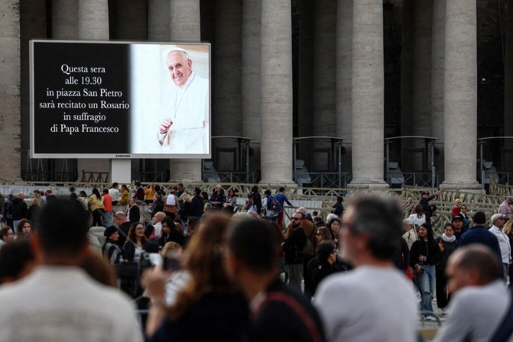 Faithful attend a rosary in homage to Pope Francis following his death in Saint Peter s Square in Vatican City, Vatican on April 21, 2025. The Vatican announced that Pope Francis, 88, died on April 21st in the morning.