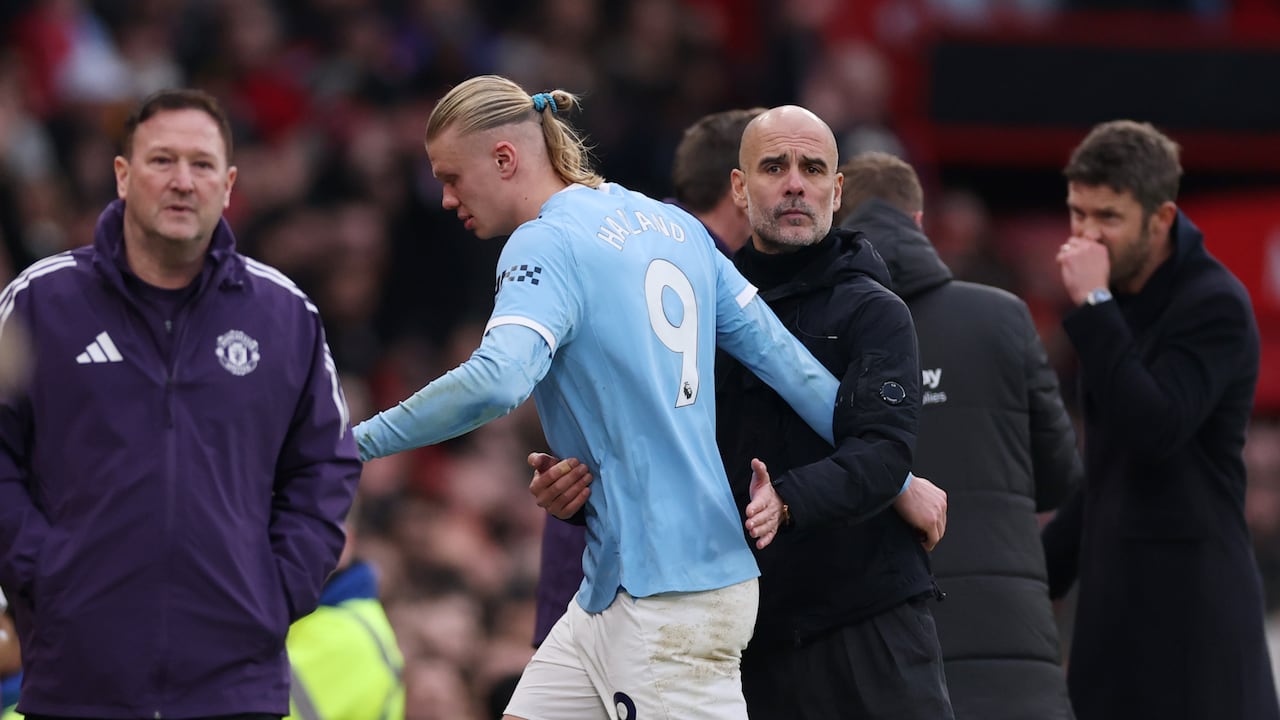 Erling Haaland y Pep Guardiola.