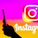 BRAZIL - 2022/03/21: In this photo illustration, a woman's silhouette is holding a smartphone with an Instagram logo in the background. (Photo Illustration by Rafael Henrique/SOPA Images/LightRocket via Getty Images)