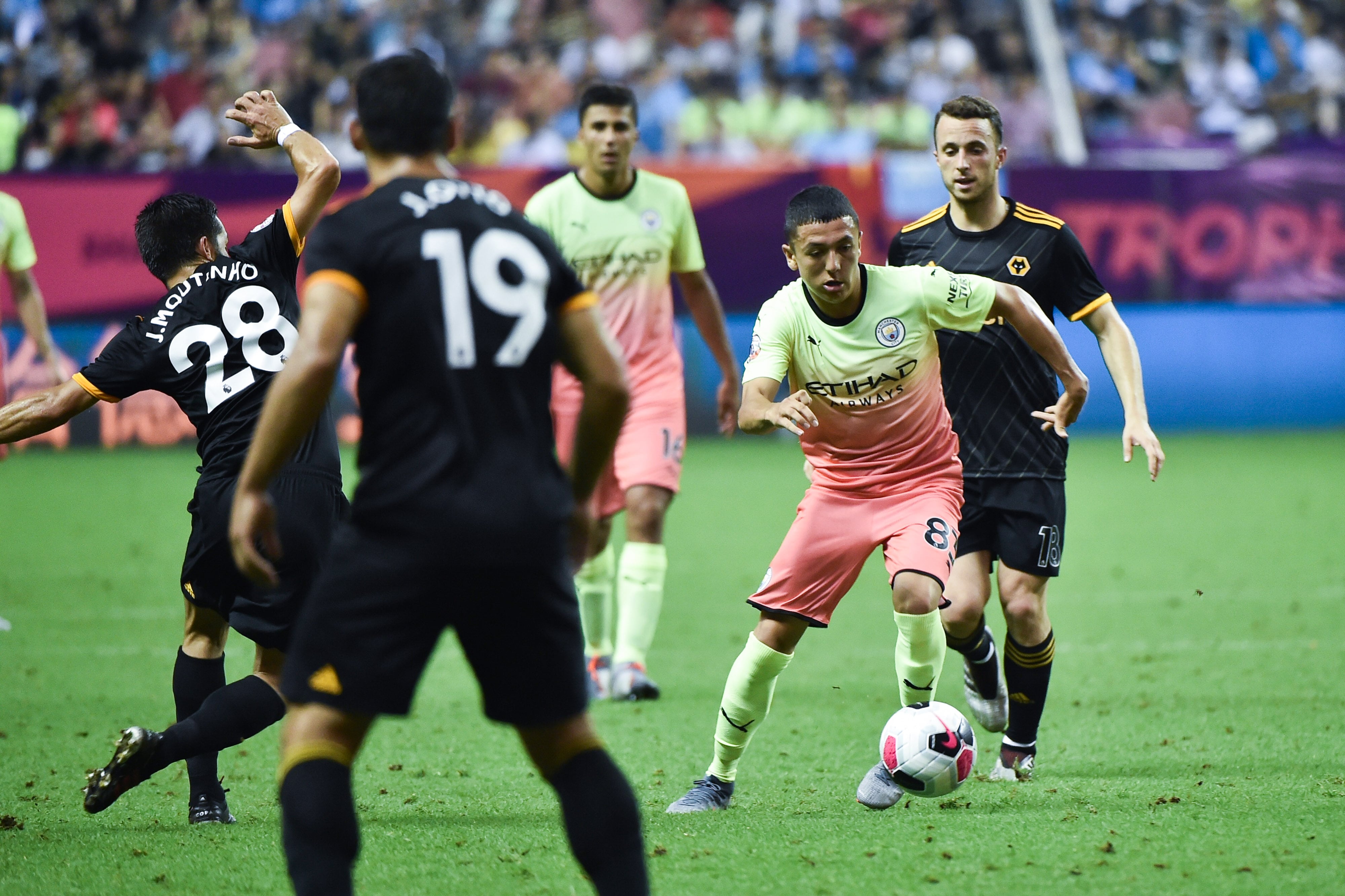 SHANGHAI, CHINA - JULY 20: Ian Carlo Poveda-Ocampo #83 of Manchester City drives the ball during the Premier League Asia Trophy final match between Manchester City and Wolverhampton Wanderers at Hongkou Football Stadium on July 20, 2019 in Shanghai, China. (Photo by Visual China Group via Getty Images/Visual China Group via Getty Images)