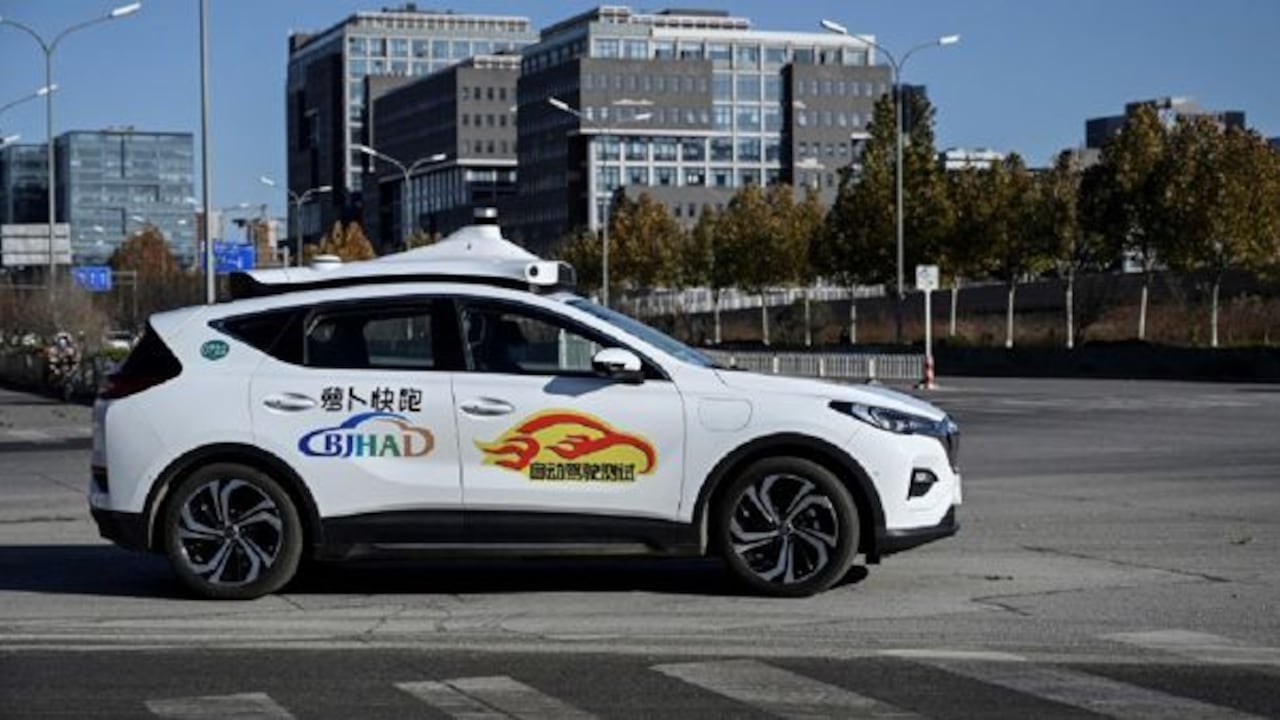 Primeros taxis sin conductor entran en servicio en Pekín. Fuente: AFP or licensors | Fotógrafo: JADE GAO