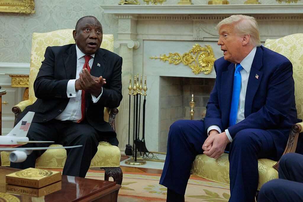 WASHINGTON, DC - MAY 21: U.S. President Donald Trump and South Africa President Cyril Ramaphosa debate during a press availability in the Oval Office at the White House on May 21, 2025 in Washington, DC. Relations between the two countries have been strained since Trump signed an executive order in February that claimed white South Africans are the victims of government land confiscation and race-based “genocide,” while admitting some of those Afrikaners as refugees to the United States. Trump also halted all foreign aid to South Africa and expelled the country’s Ambassador to the U.S., Ebrahim Rasool. (Photo by Chip Somodevilla/Getty Images)