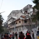 Civil defense team members clear debris in a house hit in shelling from the government position in Areha, Syria, on Thursday, Oct. 5, 2023. (AP Photo/Ghaith Alsayed)