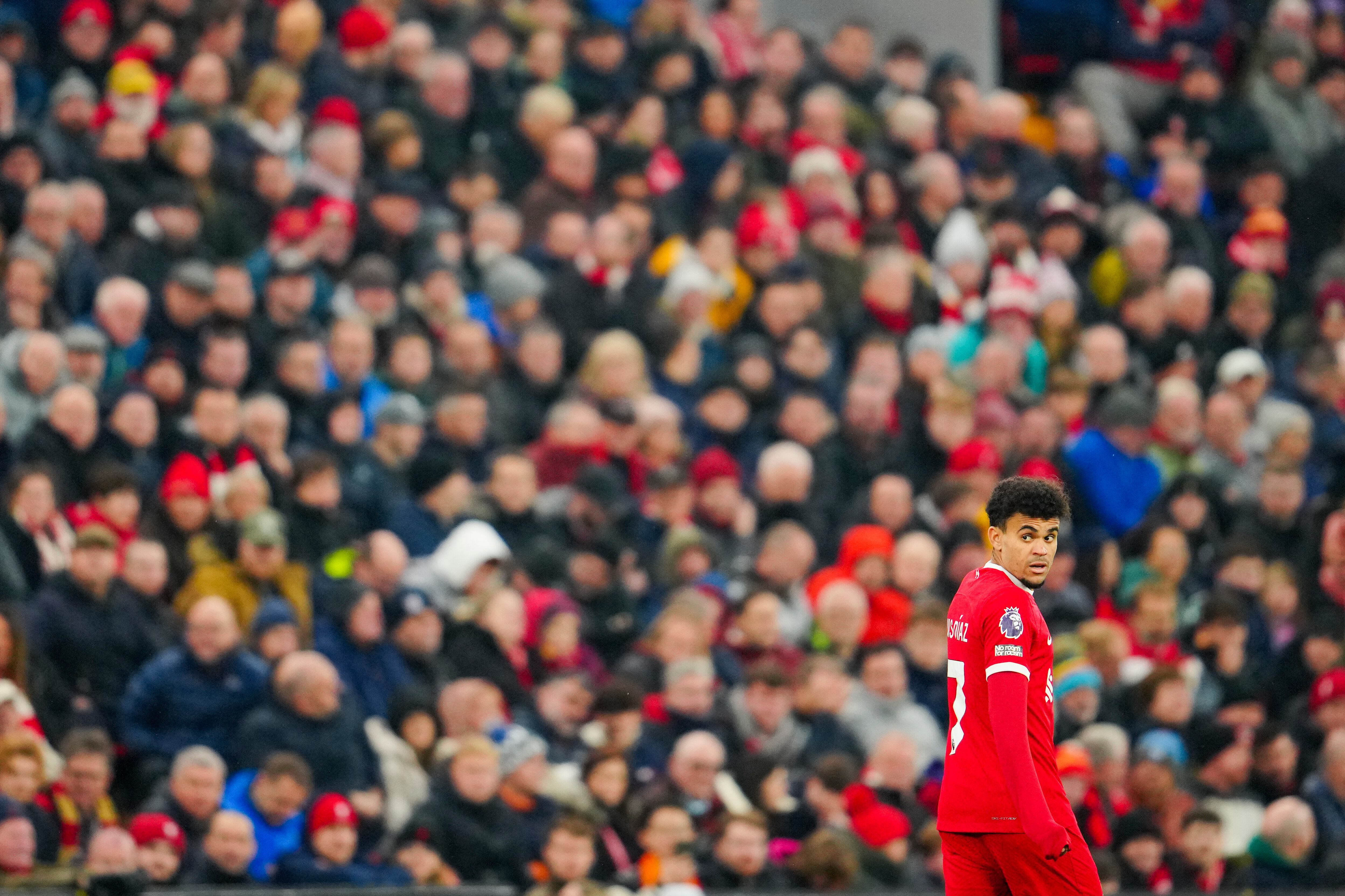 Liverpool's Luis Diaz enters to the pitch during the English Premier League soccer match between Liverpool and Brentford at Anfield stadium in Liverpool, England, Sunday, Nov. 12, 2023. (AP Photo/Jon Super)