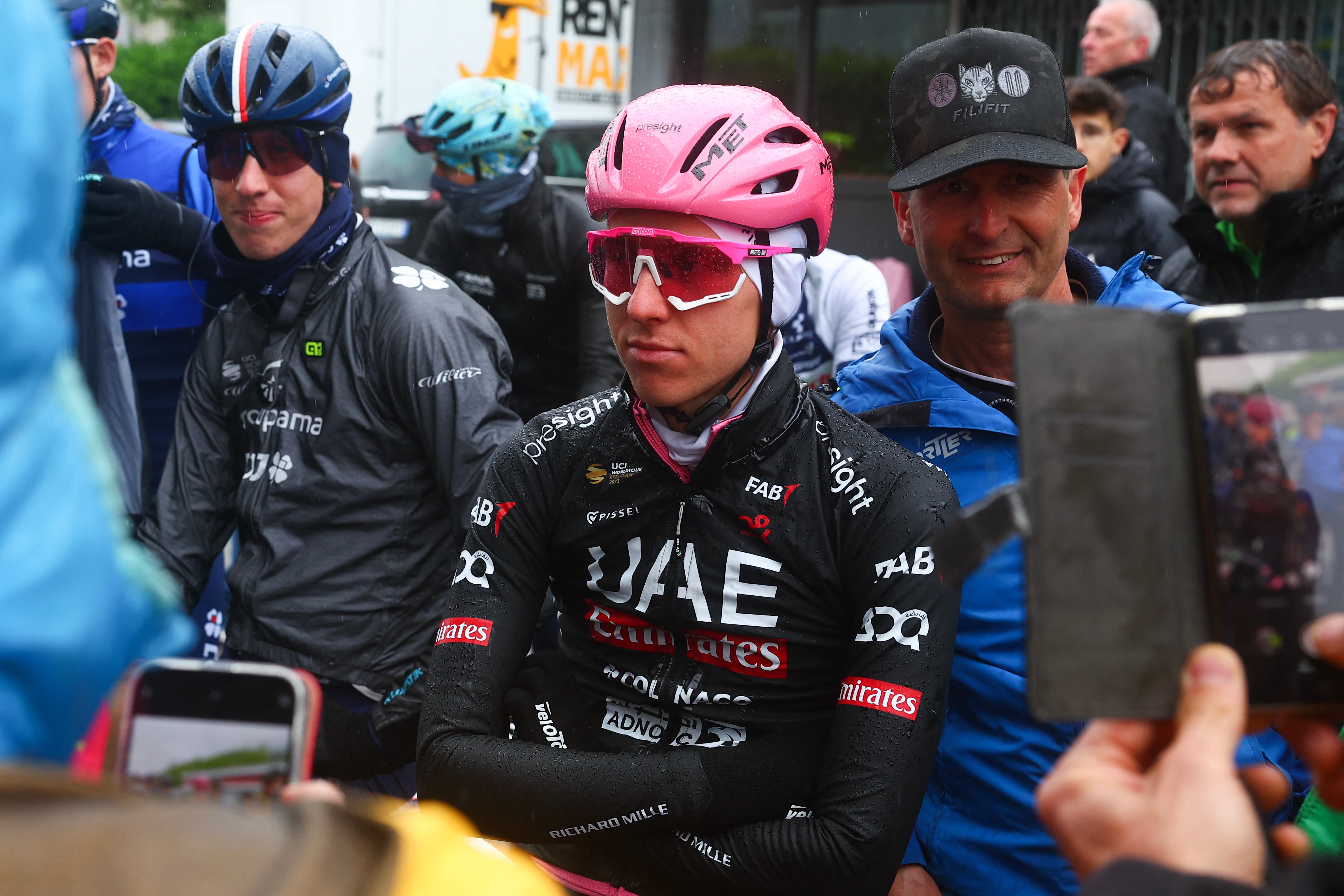 Team UAE's Slovenian rider Tadej Pogacar waits for the start of the race during the 16th stage of the 107th Giro d'Italia cycling race, 206km between Livigno and Santa Cristina Val Gardena on May 21, 2024. Due to bad weather condition, the route changed and the start takes place in Lasa. (Photo by Luca Bettini / AFP)