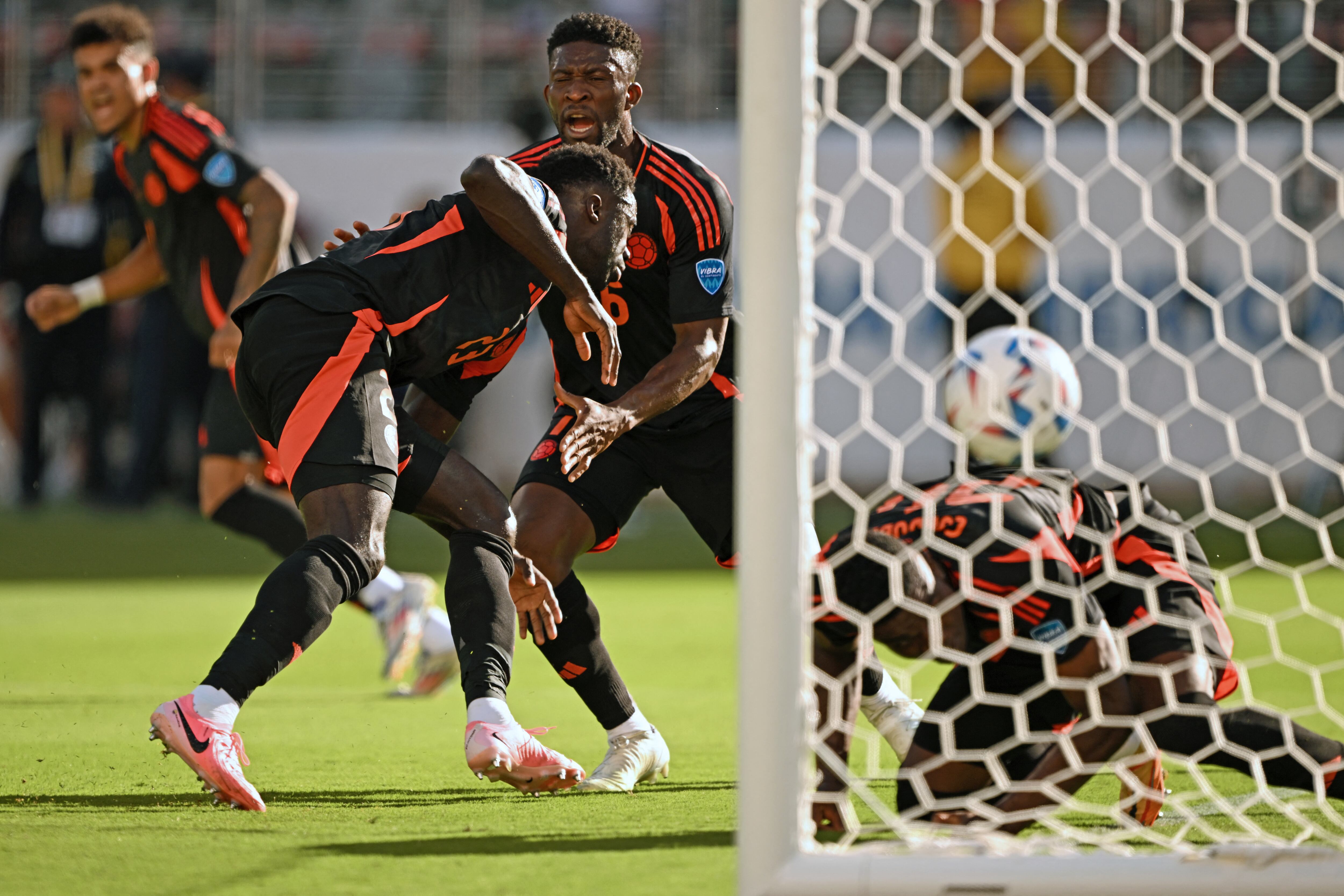 Colombia's defender #23 Davinson Sanchez (2nd L) scores a goal which was later disallowed after a VAR review during the Conmebol 2024 Copa America tournament group D football match between Brazil and Colombia at Levi's Stadium in Santa Clara, California on July 2, 2024. (Photo by Patrick T. Fallon / AFP)
