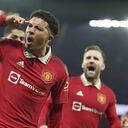 Manchester United's Jadon Sancho celebrates after scoring his sides second goal during the English Premier League soccer match between Manchester United and Leeds United at Old Trafford in Manchester, England, Wednesday, Feb. 8, 2023. (AP Photo/Dave Thompson)