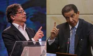 Gustavo Petro (izquierda), senador y precandidato presidencial; José Félix Lafaurie, presidente de Fedegan.