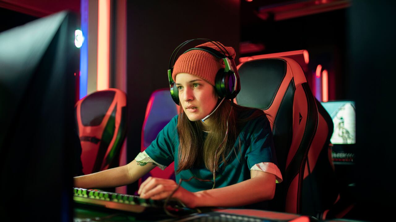 Close up of a female eSports team competing in an eSports tournament at an eSports Venue