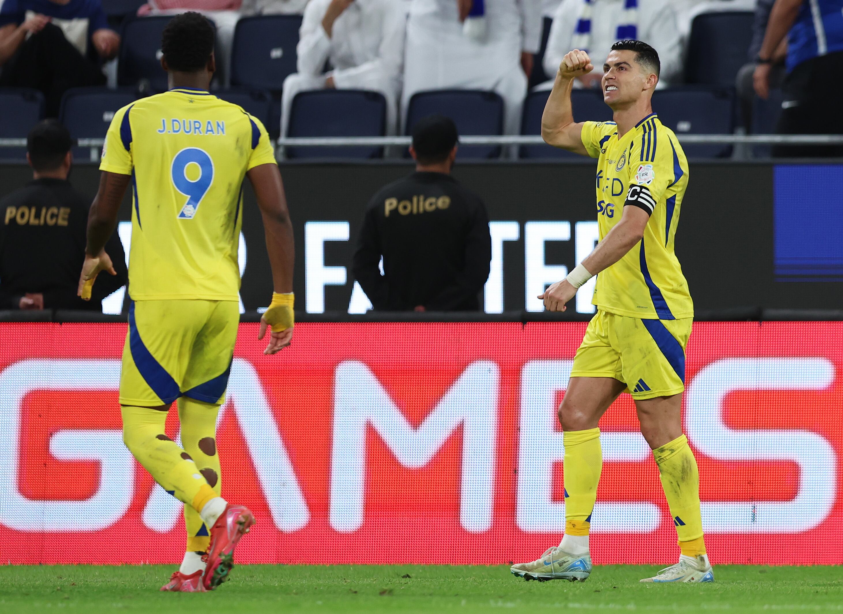 RIYADH, SAUDI ARABIA - APRIL 04: Cristiano Ronaldo of Al Nassr celebrates scoring his team's third goal with teammate Jhon Duran during the Saudi Pro League match between Al Hilal v Al Nassr in the Kingdom Arena on April 04, 2025 in Riyadh, Saudi Arabia. (Photo by Yasser Bakhsh/Getty Images)