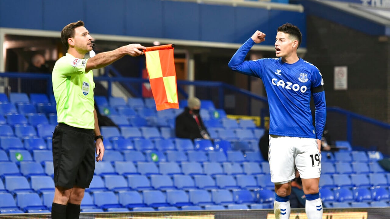Everton's James Rodriguez gestures as he speaks to the assistant referee following a disalowed goal for offside during the English Premier League soccer match between Everton and Leeds United, at Goodison Park in Liverpool, England, Saturday Nov. 28, 2020. (Peter Powell/Pool Via AP)