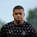 PSG's Kylian Mbappe runs during the warm up before the French League One soccer match between Troyes and Paris Saint Germain, at the Stade de l'Aube, in Troyes, France, Saturday, Aug. 7, 2021. (AP Photo/Francois Mori)