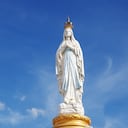 Our Lady, Virgin Mary, Mother of God in cloud sky