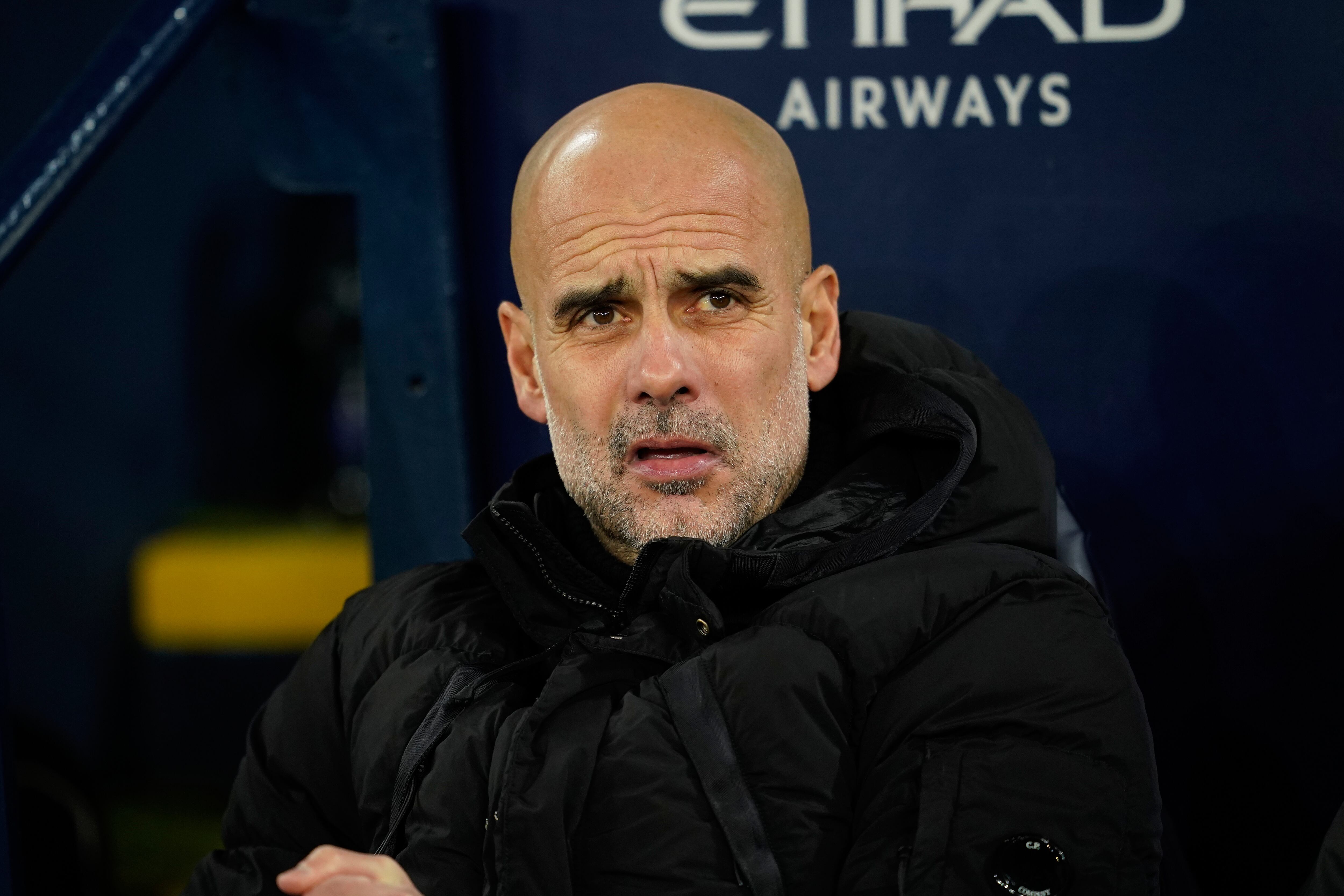 Manchester City's head coach Pep Guardiola looks on prior to the start of the English Premier League soccer match between Manchester City and Brighton and Hove Albion in Manchester, England, Wednesday, Jan. 7, 2026. (AP Photo/Dave Thompson)