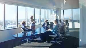 Empresarios modernos y chic que trabajan en un increíble espacio de oficina futurista y original