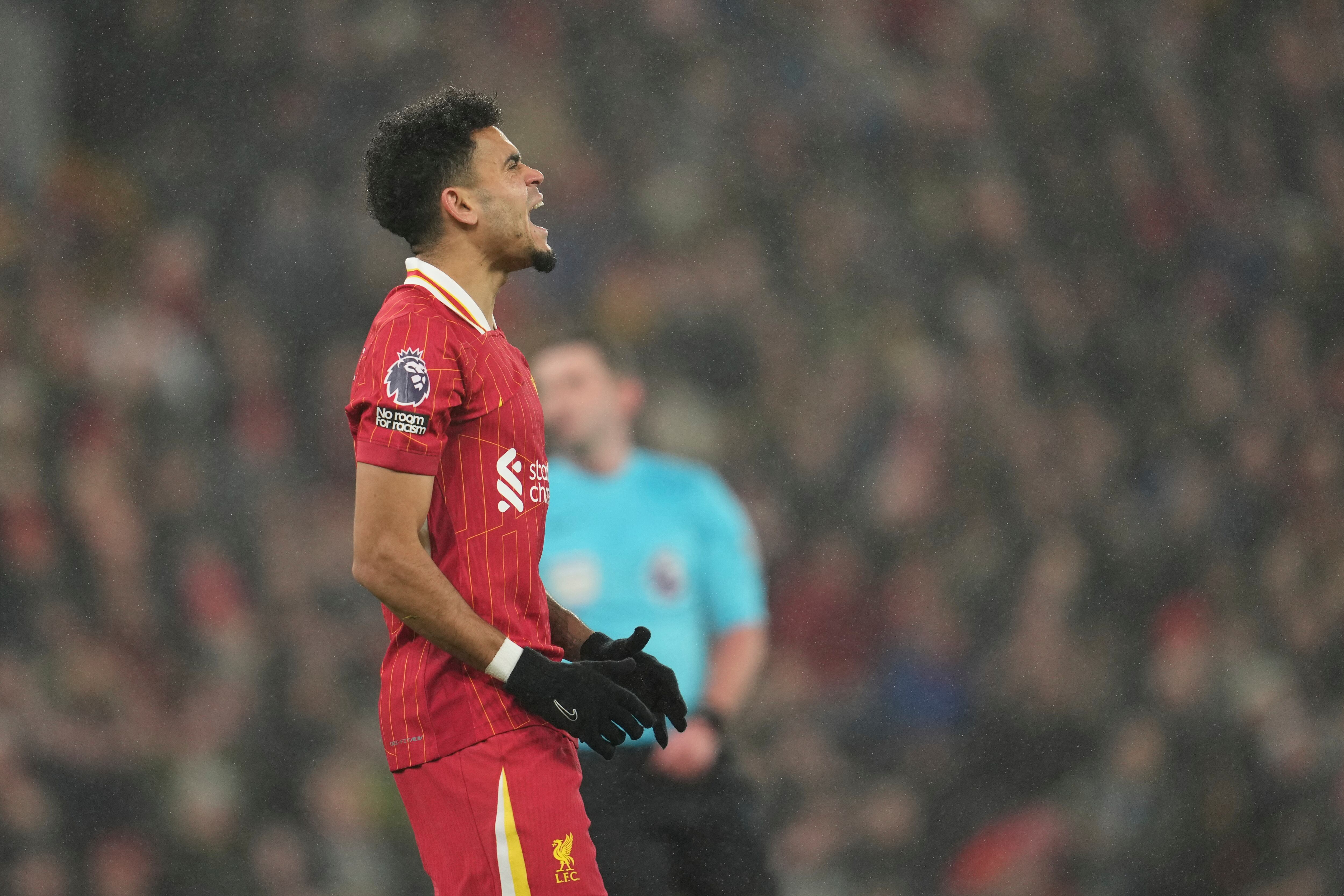 Liverpool's Luis Diaz after missing a chance to score against Manchester United during the English Premier League soccer match at the Anfield stadium in Liverpool, England, Sunday, Jan. 5, 2025. (AP Photo/Jon Super)