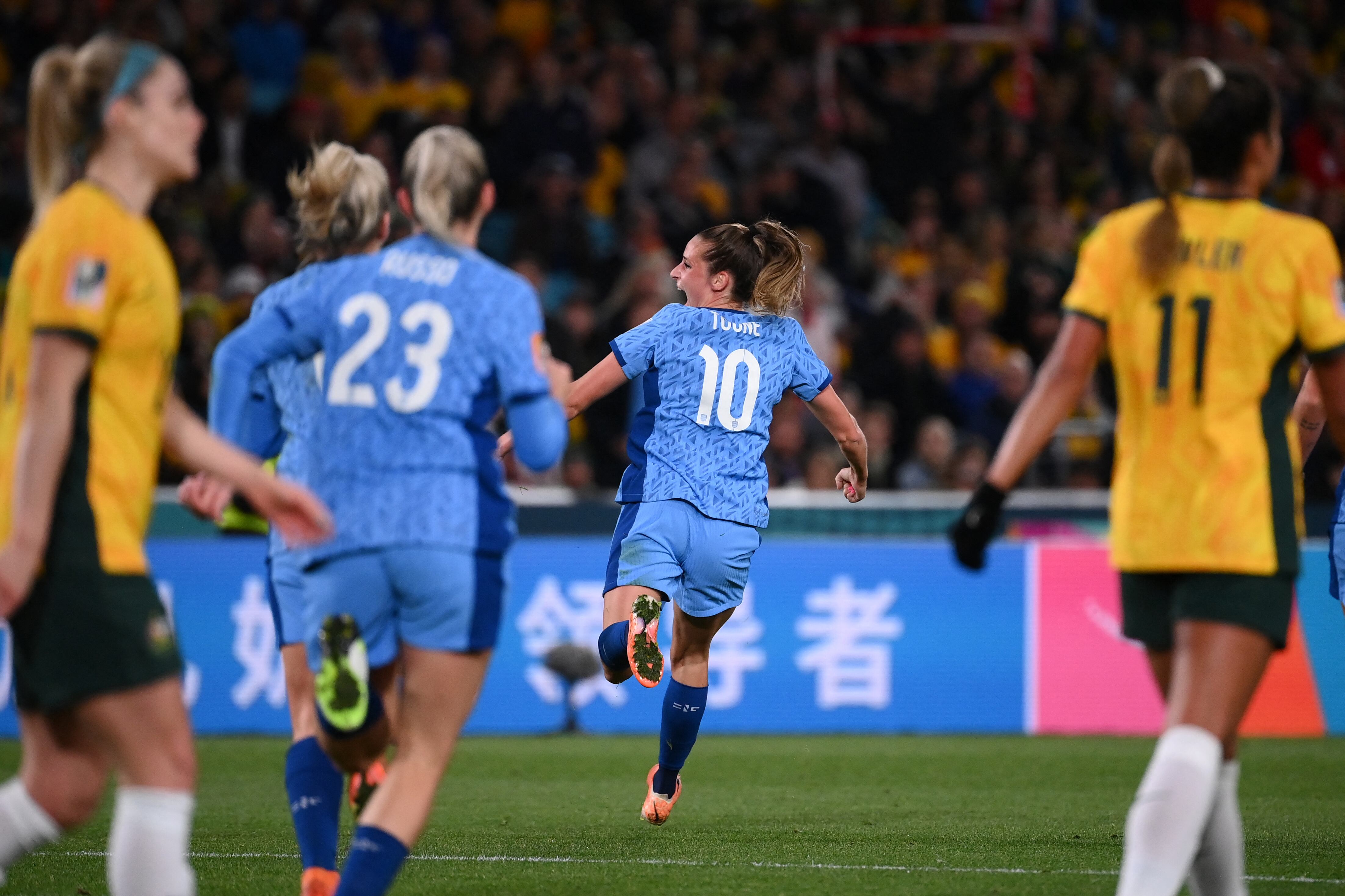 England's midfielder #10 Ella Toone celebrates scoring her team's first goal during the Australia and New Zealand 2023 Women's World Cup semi-final football match between Australia and England at Stadium Australia in Sydney on August 16, 2023. (Photo by FRANCK FIFE / AFP)