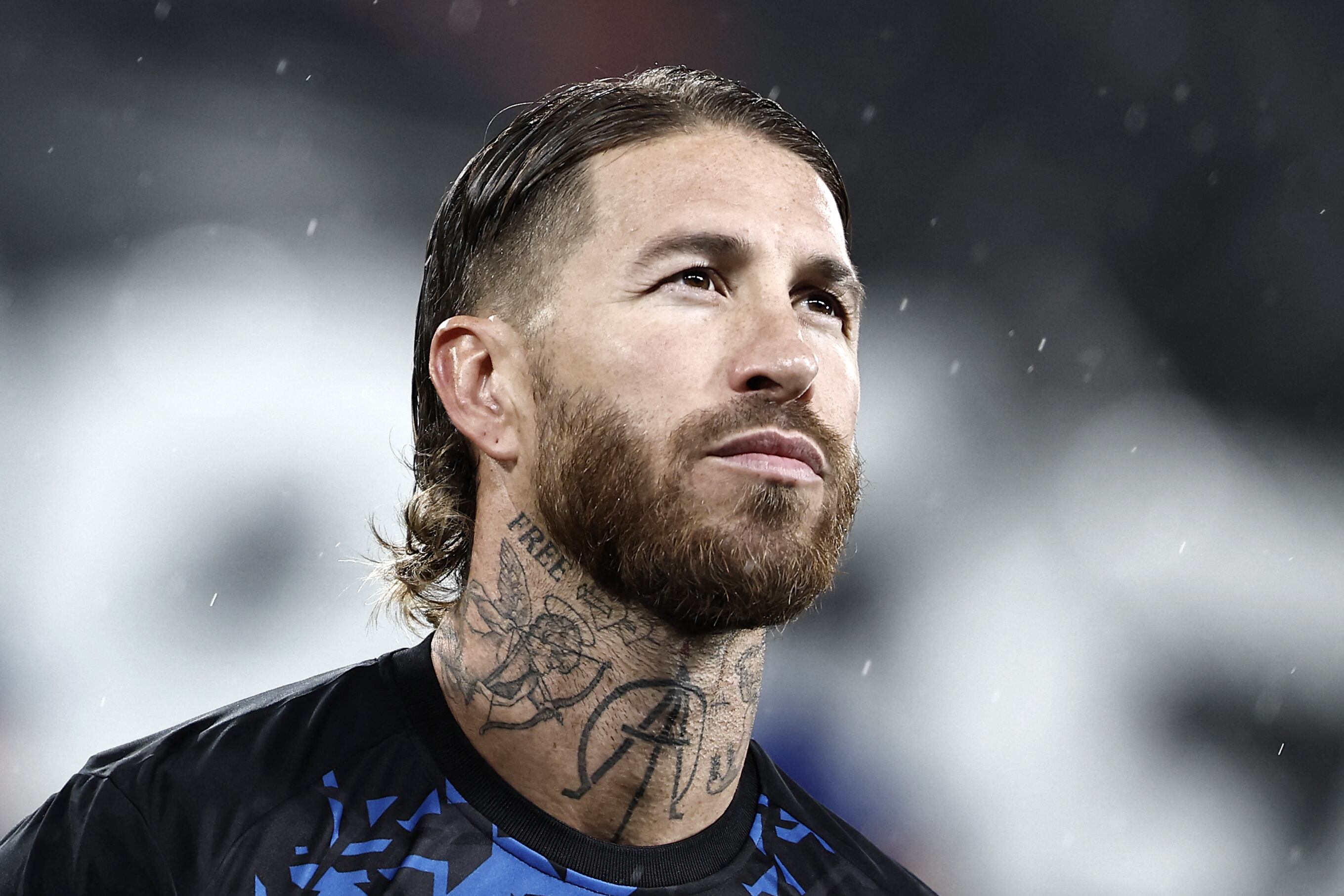 (FILES) Sevilla's Spanish defender #04 Sergio Ramos listens to the national anthem before the Champions League football match between RC Lens and Sevilla at the Stade Bollaert-Delelis in Lens, northern France, on December 12, 2023. Veteran Spanish defender Sergio Ramos has told hometown club Sevilla his second stint with them is over after just one season, the La Liga outfit said on June 17, 2024. (Photo by Sameer Al-Doumy / AFP)