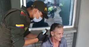 Policía Cali, habitante de calle